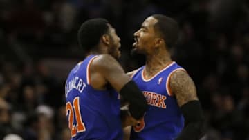 Jan 2, 2014; San Antonio, TX, USA; New York Knicks guard Iman Shumpert (21) celebrates a score with J.R. Smith (right) during the second half against the San Antonio Spurs at AT&T Center. The Knicks won 105-101. Mandatory Credit: Soobum Im-USA TODAY Sports