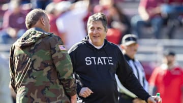 FAYETTEVILLE, ARKANSAS - NOVEMBER 6: Head Coach Sam Pittman of the Arkansas Razorbacks talks on the field before the game with Head Coach Mike Leach of the Mississippi State Bulldogs at Donald W. Reynolds Stadium on November 6, 2021 in Fayetteville, Arkansas. The Razorbacks defeated the Bulldogs 31-28. (Photo by Wesley Hitt/Getty Images)
