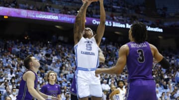 CHAPEL HILL, NORTH CAROLINA - DECEMBER 14: Armando Bacot #5 of the North Carolina Tar Heels goes up for a dunk against the Furman Paladins during the second half of their game at the Dean E. Smith Center on December 14, 2021 in Chapel Hill, North Carolina. (Photo by Grant Halverson/Getty Images)