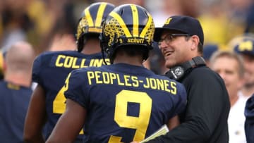 ANN ARBOR, MI - OCTOBER 06: Donovan Peoples-Jones #9 of the Michigan Wolverines celebrates a second half touchdown with head coach Jim Harbaugh while playing the Maryland Terrapins on October 6, 2018 at Michigan Stadium in Ann Arbor, Michigan. (Photo by Gregory Shamus/Getty Images)