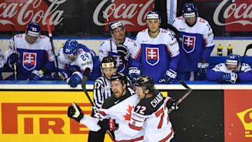 Canada's forward Mark Stone (C) and Canada's defender Thomas Chabot celebrate Canada's winning goal during the IIHF Men's Ice Hockey World Championships Group A match between Slovakia and Canada on May 13, 2019 in Kosice, Slovakia. (Photo by JOE KLAMAR / AFP) (Photo credit should read JOE KLAMAR/AFP/Getty Images)
