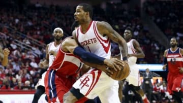 Jan 30, 2016; Houston, TX, USA; Washington Wizards guard Garrett Temple (17) is called for a foul on Houston Rockets forward Trevor Ariza (1) during the second quarter at Toyota Center. Mandatory Credit: Troy Taormina-USA TODAY Sports