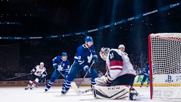 TORONTO, ON - FEBRUARY 11: Zach Hyman #11 of the Toronto Maple Leafs goes to the net against Adin Hill #31 of the Arizona Coyotes during the third period at the Scotiabank Arena on February 11, 2020 in Toronto, Ontario, Canada. (Photo by Mark Blinch/NHLI via Getty Images)