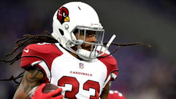MINNEAPOLIS, MN - OCTOBER 14: Tre Boston #33 of the Arizona Cardinals warms up on field before the game against the Minnesota Vikings at U.S. Bank Stadium on October 14, 2018 in Minneapolis, Minnesota. (Photo by Hannah Foslien/Getty Images)