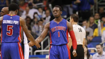 Mar 27, 2015; Orlando, FL, USA; Detroit Pistons guard Reggie Jackson (1) high fives guard Kentavious Caldwell-Pope (5) against the Orlando Magic during the second half at Amway Center. Detroit Pistons defeated the Orlando Magic 111-97. Mandatory Credit: Kim Klement-USA TODAY Sports