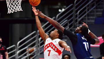 Kyle Lowry of the Toronto Raptors shoots against Naz Reid of the Minnesota Timberwolves. (Photo by Julio Aguilar/Getty Images)