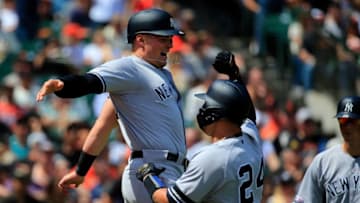 SAN FRANCISCO, CALIFORNIA - APRIL 27: Gary Sanchez #24 of the New York Yankees celebrates a grand slam with Luke Voit #45 during the fifth inning against the San Francisco Giants at Oracle Park on April 27, 2019 in San Francisco, California. (Photo by Daniel Shirey/Getty Images)