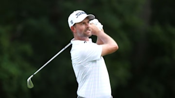 DETROIT, MICHIGAN - JULY 03: Webb Simpson of the United States plays his shot from the tenth tee during the second round of the Rocket Mortgage Classic on July 03, 2020 at the Detroit Golf Club in Detroit, Michigan. (Photo by Leon Halip/Getty Images)
