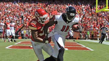 KANSAS CITY, MO - SEPTEMBER 09: Wide receiver Julio Jones #11 of the Atlanta Falcons catches a 8-yard touchdown pass against defensive back Jacques Reeves #35 of the Kansas City Chiefs during the first quarter their season opener on September 9, 2012 at Arrowhead Stadium in Kansas City, Missouri. (Photo by Peter Aiken/Getty Images)