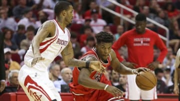 Mar 31, 2016; Houston, TX, USA; Chicago Bulls guard Jimmy Butler (21) dribbles the ball during the third quarter against the Houston Rockets at Toyota Center. Mandatory Credit: Troy Taormina-USA TODAY Sports