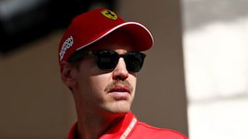 BAHRAIN, BAHRAIN - MARCH 28: Sebastian Vettel of Germany and Ferrari looks on in the Paddock during previews ahead of the F1 Grand Prix of Bahrain at Bahrain International Circuit on March 28, 2019 in Bahrain, Bahrain. (Photo by Lars Baron/Getty Images)