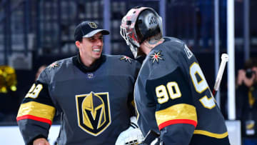 Vegas Golden Knights goaltender Robin Lehner (90) is congratulated by goaltender Marc-Andre Fleury (29) after shutting out the New Jersey Devils. Mandatory Credit: Stephen R. Sylvanie-USA TODAY Sports