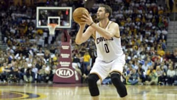 Apr 15, 2015; Cleveland, OH, USA; Cleveland Cavaliers forward Kevin Love (0) shoots in the second quarter against the Washington Wizards at Quicken Loans Arena. Mandatory Credit: David Richard-USA TODAY Sports