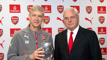 ST ALBANS, ENGLAND - SEPTEMBER 30: Arsenal manager, Arsene Wenger is presented a gift by Chairman Sir Chips Keswick to mark his twenty years at the club at a press conference at London Colney training ground on September 30, 2016 in St Albans, England. (Photo by Alan Walter/Arsenal FC via Getty Images)