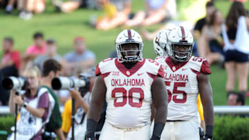 WACO, TX - SEPTEMBER 23: Oklahoma linemen Neville Gallimore (90) and Kenneth Mann (55) watch action during game between the Oklahoma Sooners and the Baylor Bears on September 23, 2017 at McLane Stadium in Waco, TX. (Photo by John Rivera/Icon Sportswire via Getty Images)
