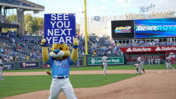 The Kansas City Royals mascot Sluggerrr displays a sign to the fans Mandatory Credit: Denny Medley-USA TODAY Sports