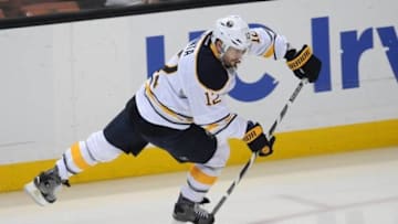 February 24, 2016; Anaheim, CA, USA; Buffalo Sabres right wing Brian Gionta (12) shoots on goal against Anaheim Ducks during the second period at Honda Center. Mandatory Credit: Gary A. Vasquez-USA TODAY Sports