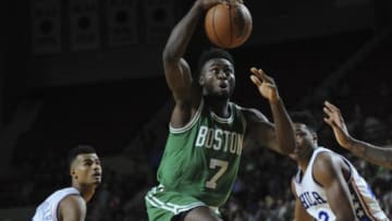 Oct 4, 2016; Amherst, MA, USA; Boston Celtics forward Jaylen Brown (7) prepares to shoot the ball past Philadelphia 76ers guard Timothe Luwawu-Cabarrot (20) during the second half at William D. Mullins Center. Mandatory Credit: Bob DeChiara-USA TODAY Sports