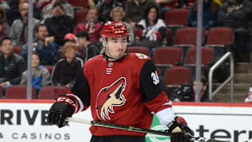 GLENDALE, AZ - DECEMBER 02: Joel Hanley #39 of the Arizona Coyotes gets ready during a faceoff against the New Jersey Devils at Gila River Arena on December 2, 2017 in Glendale, Arizona. (Photo by Norm Hall/NHLI via Getty Images)