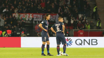 PARIS, FRANCE - DECEMBER 11: Edinson Cavani and Marco Verratti of Paris Saint-Germain appear disappointed after the goal of OGC Nice during the French Ligue 1 match between Paris Saint-Germain and OGC Nice at Parc des Princes on december 11, 2016 in Paris, France. (Photo by Xavier Laine/Getty Images)