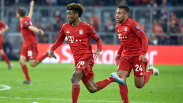 MUNICH, GERMANY - NOVEMBER 06: Kingsley Coman of FC Bayern Muenchen and Corentin Tolisso of FC Bayern Muenchen controls the ball during the UEFA Champions League group B match between Bayern Muenchen and Olympiacos FC at Allianz Arena on November 6, 2019 in Munich, Germany. (Photo by TF-Images/Getty Images)