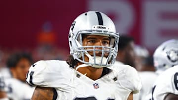 Aug 12, 2016; Glendale, AZ, USA; Oakland Raiders tight end Mychal Rivera (81) against the Arizona Cardinals during a preseason game at University of Phoenix Stadium. Mandatory Credit: Mark J. Rebilas-USA TODAY Sports