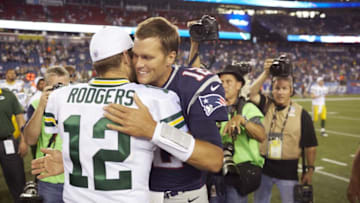 Football: New England Patriots QB Tom Brady (12) and Green Bay Packers QB Aaron Rodgers (12) greet each other on field after preseason game at Gillette Stadium.Foxborough, MA 8/13/2015CREDIT: Tim Clayton (Photo by Tim Clayton /Sports Illustrated/Getty Images)(Set Number: X159854 TK1 )