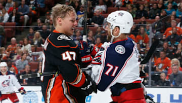 ANAHEIM, CA - NOVEMBER 4: Hampus Lindholm #47 of the Anaheim Ducks and Nick Foligno #71 of the Columbus Blue Jackets tangle up during the second period of the game at Honda Center on November 4, 2018 in Anaheim, California. (Photo by Debora Robinson/NHLI via Getty Images)