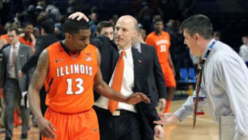 Feb 9, 2014; University Park, PA, USA; Illinois Fighting Illini guard Tracy Abrams (13) celebrates with Fighting Illini head coach John Groce after the game against the Penn State Nittany Lions at Bryce Jordan Center. The Fighting Illini won 60-55. Mandatory Credit: Matthew O