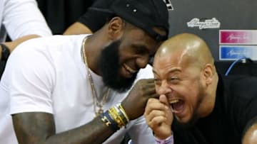 LAS VEGAS, NV - JULY 15: LeBron James (L) of the Los Angeles Lakers and his friend Paul Rivera share a laugh as they attend a quarterfinal game of the 2018 NBA Summer League between the Lakers and the Detroit Pistons at the Thomas & Mack Center on July 15, 2018 in Las Vegas, Nevada. NOTE TO USER: User expressly acknowledges and agrees that, by downloading and or using this photograph, User is consenting to the terms and conditions of the Getty Images License Agreement. (Photo by Ethan Miller/Getty Images)