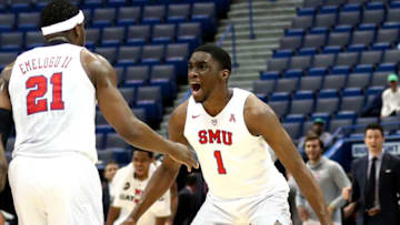 HARTFORD, CT - MARCH 11: Ben Emelogu II #21 of the Southern Methodist Mustangs celebrates with Shake Milton #1 after hitting a three point shot during the championship game of the AAC Basketball Tournament against the Cincinnati Bearcats at the XL Center on March 11, 2017 in Hartford, Connecticut. (Photo by Maddie Meyer/Getty Images)