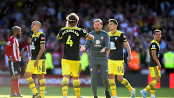 SHEFFIELD, ENGLAND - SEPTEMBER 14: Jannik Vestergaard and Ralph Hasenhuttl, Manager of Southampton celebrate following their sides victory in the Premier League match between Sheffield United and Southampton FC at Bramall Lane on September 14, 2019 in Sheffield, United Kingdom. (Photo by Nathan Stirk/Getty Images)