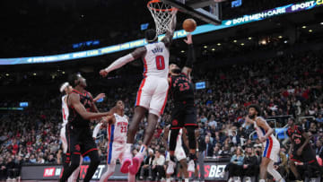 Toronto Raptors guard Fred VanVleet (23) drives to the basket as Detroit Pistons center Jalen Duren (0) tries to defend Credit: Nick Turchiaro-USA TODAY Sports