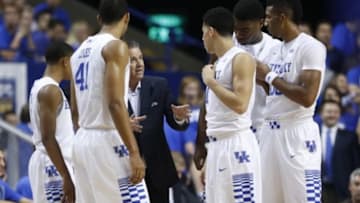 Nov 9, 2014; Lexington, KY, USA; Kentucky Wildcats head coach John Calipari talks with his team during a time in the game against the Georgetown Tigers in the first half at Rupp Arena. Kentucky defeated Georgetown 121-52. Mandatory Credit: Mark Zerof-USA TODAY Sports