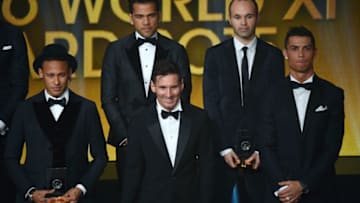 (From L) Brazil and FC Barcelona forward Neymar, Brazil and FC Barcelona defender Dani Alves, Argentina and FC Barcelona forward Lionel Messi, Spain and FC Barcelona midfielder Andres Iniesta and Portugal and Real Madrid forward Cristiano Ronaldo. (Photo credit OLIVIER MORIN/AFP via Getty Images)