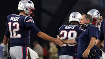 FOXBOROUGH, MA - AUGUST 16: New England Patriots quarterback Tom Brady (12) is congratulated by New England Patriots head coach Bill Belichick after throwing his first touchdown pass during the first quarter. The New England Patriots host the Philadelphia Eagles in the second pre-season home exhibition game at Gillette Stadium in Foxborough, MA on Aug. 16, 2018. (Photo by Barry Chin/The Boston Globe via Getty Images)