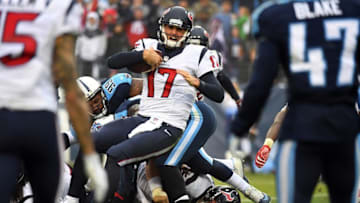 Jan 1, 2017; Nashville, TN, USA; Houston Texans quarterback Brock Osweiler (17) runs for a touchdown during the second half against the Tennessee Titans at Nissan Stadium. The Titans won 24-17. Mandatory Credit: Christopher Hanewinckel-USA TODAY Sports