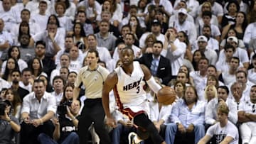May 9, 2016; Miami, FL, USA; Miami Heat guard Dwyane Wade (3) dribbles the ball against the Toronto Raptors during the fourth quarter in game four of the second round of the NBA Playoffs at American Airlines Arena. The Heat won in overtime 94-87. Mandatory Credit: Steve Mitchell-USA TODAY Sports
