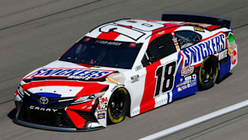 LAS VEGAS, NEVADA - FEBRUARY 21: Kyle Busch, driver of the #18 Snickers White Toyota, drives during practice for the NASCAR Cup Series at Las Vegas Motor Speedway on February 21, 2020 in Las Vegas, Nevada. (Photo by Jonathan Ferrey/Getty Images)