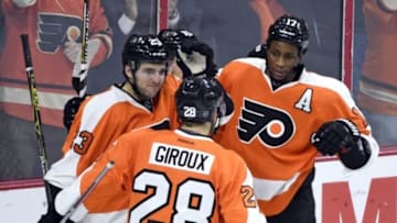 Jan 25, 2016; Philadelphia, PA, USA; Philadelphia Flyers right wing Wayne Simmonds (17) celebrates his goal with defenseman Brandon Manning (23) and center Claude Giroux (28) against the Boston Bruins during the third period at Wells Fargo Center. The Burins defeated the Flyers, 3-2. Mandatory Credit: Eric Hartline-USA TODAY Sports