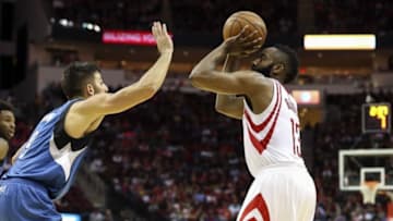Mar 18, 2016; Houston, TX, USA; Houston Rockets guard James Harden (13) shoots the ball during the second quarter as Minnesota Timberwolves guard Ricky Rubio (9) defends at Toyota Center. The Rockets won 116-111. Mandatory Credit: Troy Taormina-USA TODAY Sports
