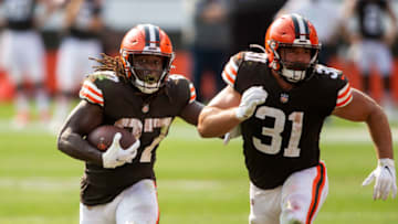 Sep 27, 2020; Cleveland, Ohio, USA; Cleveland Browns running back Kareem Hunt (27) runs the ball as running back Andy Janovich (31) blocks for him against the Washington Football Team during the fourth quarter at FirstEnergy Stadium. The Browns won 34-20. Mandatory Credit: Scott Galvin-USA TODAY Sports