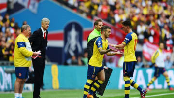 LONDON, ENGLAND - MAY 30: Substitute Jack Wilshere of Arsenal replaces Mesut Oezil during the FA Cup Final between Aston Villa and Arsenal at Wembley Stadium on May 30, 2015 in London, England. (Photo by Shaun Botterill/Getty Images)