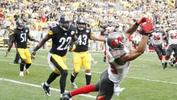 Sep 28, 2014; Pittsburgh, PA, USA; Tampa Bay Buccaneers wide receiver Vincent Jackson (83) catches a five yard game winning touchdown pass with seven seconds left against the Pittsburgh Steelers during the fourth quarter at Heinz Field. The Bucaneers won 27-24. Mandatory Credit: Charles LeClaire-USA TODAY Sports