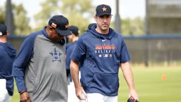 WEST PALM BEACH, FLORIDA - FEBRUARY 13: Manager Dusty Baker of the Houston Astros talks with Justin Verlander #35 of the Houston Astros during a team workout at FITTEAM Ballpark of The Palm Beaches on February 13, 2020 in West Palm Beach, Florida. (Photo by Michael Reaves/Getty Images)