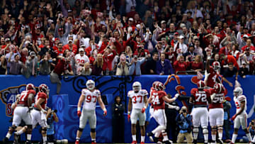 NEW ORLEANS, LA - JANUARY 01: T.J. Yeldon #4 of the Alabama Crimson Tide celebrates with his teammate after scoring a two yard touchdown in the second quarter against the Ohio State Buckeyes during the All State Sugar Bowl at the Mercedes-Benz Superdome on January 1, 2015 in New Orleans, Louisiana. (Photo by Streeter Lecka/Getty Images)