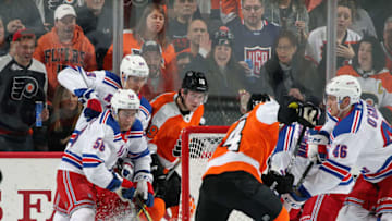 PHILADELPHIA, PA - APRIL 07: Oskar Lindblom #54 and Nolan Patrick #19 of the Philadelphia Flyers battle on a scoring opportunity against Henrik Lundqvist #30, Pavel Buchnevich #89, John Gilmour #58, Vladislav Namestniko #90 and Rob O'Gara #46 of the New York Rangers on April 7, 2018 at the Wells Fargo Center in Philadelphia, Pennsylvania. (Photo by Len Redkoles/NHLI via Getty Images)