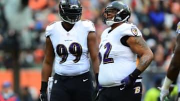 Dec 29, 2013; Cincinnati, OH, USA; Baltimore Ravens defensive end Chris Canty (99) and nose tackle Terrence Cody (62) against the Cincinnati Bengals at Paul Brown Stadium. Bengals defeated the Ravens 34-17. Mandatory Credit: Andrew Weber-USA TODAY Sports