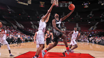 PORTLAND, OR - APRIL 9: Andres Feliz #4 the World Select Team drives to the basket against the USA Junior Select Team during the game on April 9, 2016 at the MODA Center Arena in Portland, Oregon. NOTE TO USER: User expressly acknowledges and agrees that, by downloading and or using this photograph, User is consenting to the terms and conditions of the Getty Images License Agreement. Mandatory Copyright Notice: Copyright 2016 NBAE (Photo by Sam Forencich/NBAE via Getty Images)