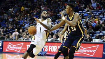 Jan 8, 2016; New Orleans, LA, USA; New Orleans Pelicans guard Tyreke Evans (1) drives down the court as he is defended by Indiana Pacers forward Myles Turner (33) during the first quarter of the game at the Smoothie King Center. Mandatory Credit: Matt Bush-USA TODAY Sports